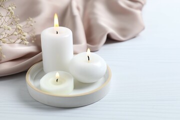 Beautiful composition with candles on the table