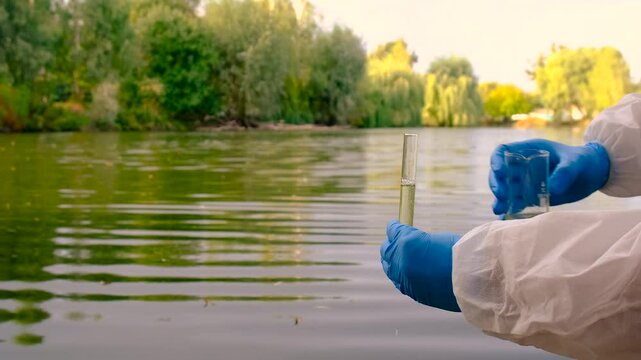 Conduct a water study on a river. Selective focus.