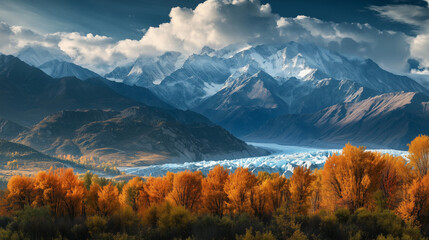 Autumn Majesty: Vibrant Orange Trees Against Majestic Snow-Capped Mountains and Glacier