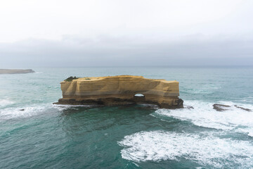 The Bakers Oven so called for the shape of the natural arch in the cliff face. A sea stack on the...