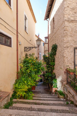 An alley among the stone houses of Maranola, a small medieval town in the municipality of Formia, Italy.