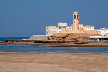 Sur (Ṣūr,Sour) Ash Sharqiyah Oman Sultanat Moyen Orient. Lighthouse and Traditional wooden dhow boats in Sur, Oman