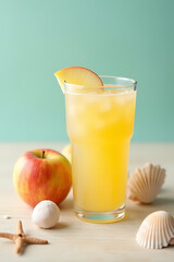 A refreshing summer concept that combines the simplicity of apple juice with a set of decorative seashells._00002_