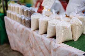 Rice packets are placed on the shelves in the market, an export product from farmers in the Asian region of the world, and an important national food staple for everyone.