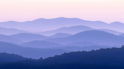 Fototapeta premium Serene layered mountains at sunrise, hazy purple hues.