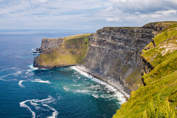 Spectacular Cliffs of Moher are sea cliffs located at the southwestern edge of the Burren region in County Clare, Ireland. Wild Atlantic way