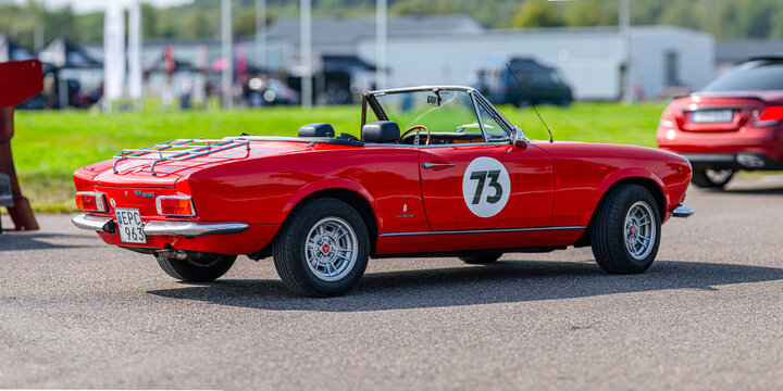 Gothenburg, Sweden - september 07 2024: Red 1973 Fiat 124 Spider on display.