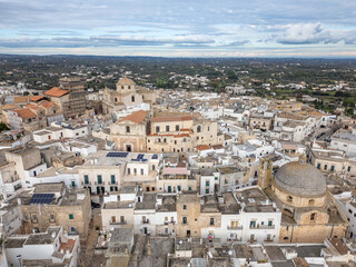 Aerial drone view of the old town center in Ceglie Messapica in Puglia, southern Italy.