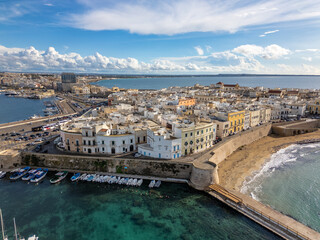 Aerial drone view of the coastal town named Gallipoli at the mediterranean sea in Italy.
