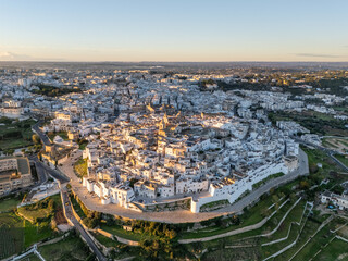 Obraz premium Aerial drone photo of the old town center in Ostuni and Puglia, southern Italy.