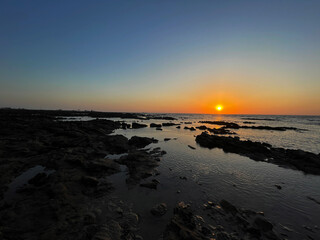 Sunset on the beach at Madh Island, Mumbai | Madh Island Mumbai | golden sunset on the beach | silver beach | arabian sea | mumbai beach | waves of water in the sea | sunset on the seashore
