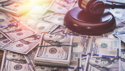 Law concept gavel and dollar money