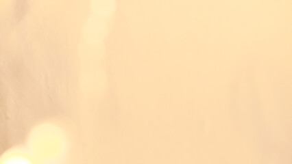 Warm golden bokeh with subtle sparkles and elegant festive vibes