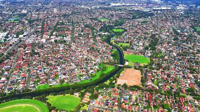 Panorama aerial drone view of western sydney Suburbs with Houses roads and parks in Sydney New South Wales NSW Australia