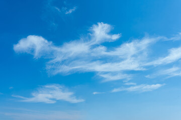 Serene Blue Sky with Wispy Cirrus Clouds Nature Background
