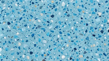 A seamless texture of small, colorful, irregular-shaped stones embedded in a smooth, pale blue surface.