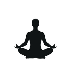 Silhouette of a man meditating in lotus pose.