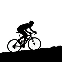 Naklejka premium Silhouette of a cyclist riding uphill on a bike