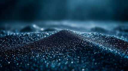 Dark blue sand dune, close-up texture.