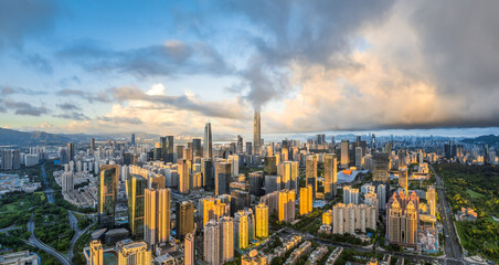 Fototapeta premium Modern city skyline and natural scenery at sunrise in Shenzhen, China