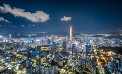 Fototapeta premium Night view of modern city financial district buildings in Shenzhen, China