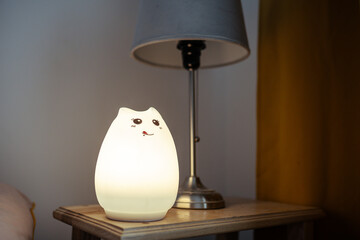 Silicone led battery powered night lamp in the night.  Toy shaped Night light.