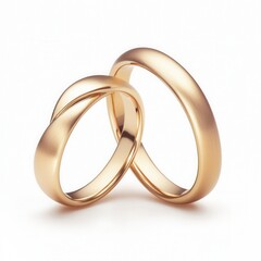 Two elegant gold wedding rings intertwined, symbolizing love and commitment.