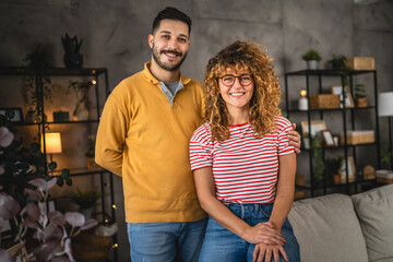 Portrait of couple girlfriend and boyfriend in love hug at home