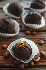 Tasty chocolate bonbon sweets on table