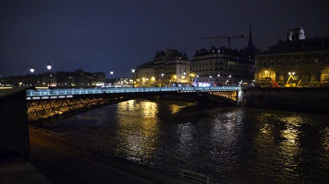 The Seine River and the Arcole Bridge. Paris, France - December 12, 2024.