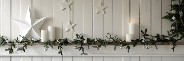 A Scandinavian-inspired Christmas wall with white star decorations, green garlands, and wooden candle holders