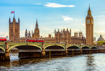 Houses of Parliament with Big Ben tower and Westminster bridge at sunset, London, UK