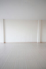 White room for the background. empty room interior, white mortar wall and clean tile floor in a new house