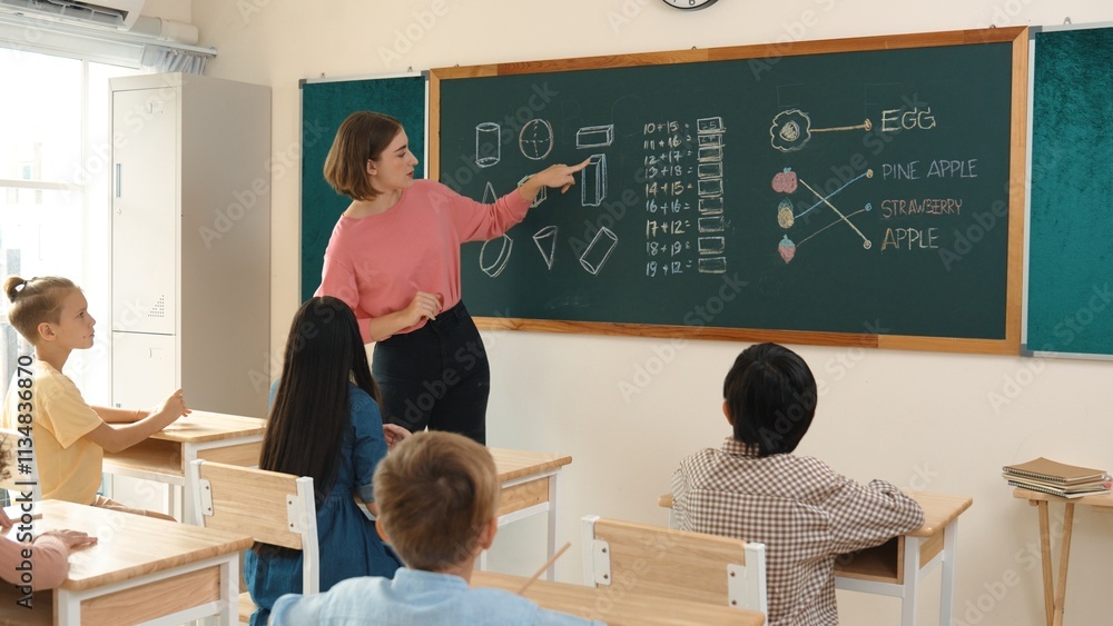 Poster smart teacher checking cute student homework while explaining idea at class. attractive instructor w