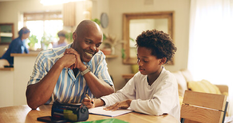 Kitchen, studying and child with dad, smile and support for son, growth or development with education. Bonding, black man and assistance for homework, writing and kid with knowledge, teaching or home