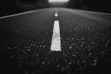 Textured dark grainy paper background for creative designs and presentations showcasing an unused asphalt road surface as a visual component or background resource