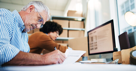 Senior man, writing and documents for distribution industry, inventory update and logistics information. People, computer and ecommerce paperwork with stock checklist, startup admin and order report