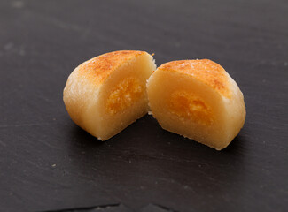 Pastel de yema, candied yolk covered in marzipan, one of many Spanish sweets typically associated with Christmas
