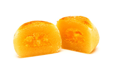 Pastel de yema, candied yolk covered in marzipan, one of many Spanish sweets typically associated with Christmas
