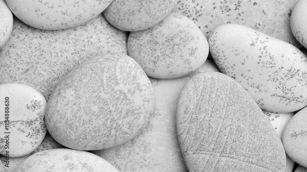 Poster round gray textured pebbles as a background for a template or web banner