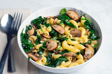  macaroni with  spinach,  and mushrooms