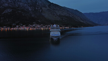 Naklejka premium Cruise ship in Kotor Bay at night