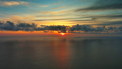 Naklejka premium Sea surface and beautiful sunset