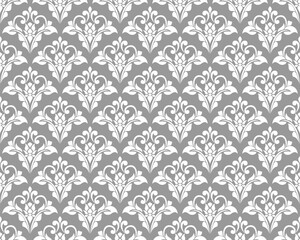 Wallpaper in Baroque style, damask. A seamless vector background. Gray and white texture Floral ornament.