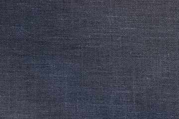 Dark navy color linen fabric texture closeup as textile background