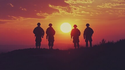 Silhouettes of soldiers with the USA flag against a sunset sky, in a powerful tribute for Veterans Day.