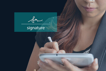 Businesswoman hand electronic signature on tablet by stylus. Write business agreement of contract....
