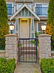 Entrance of a townhouse at dusk at Vancouver, Canada.