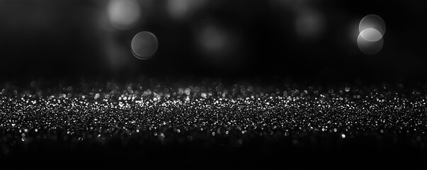 Black friday bokeh background. Elegant dark blur layout design. Silver and black glitter place on table with spotlight. Luxury abstract banner with copyspace