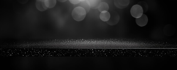 Black friday bokeh background. Elegant dark blur layout design. Silver and black glitter place on table with spotlight. Luxury abstract banner with copyspace